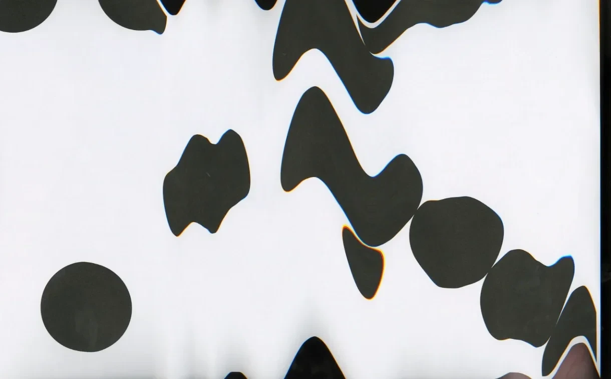 A zoomed-in print of the Firsts typeface, scanned and manipulated for glitch artifacts